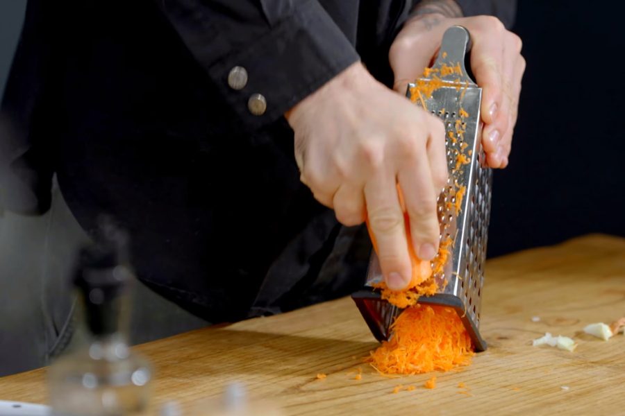 Grate and fry the carrot