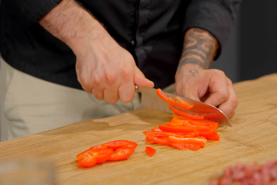 Cutting carrot into strips