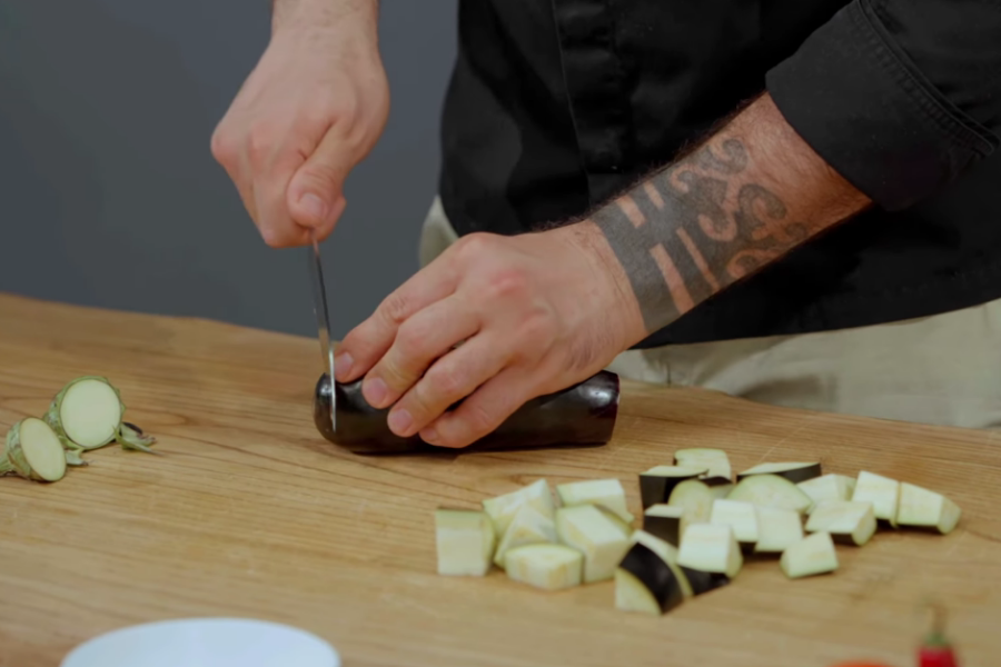 Cutting eggplants and parsley root