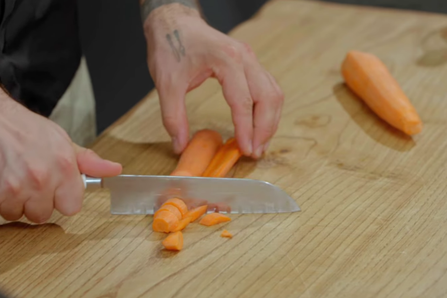 Adding carrots and onions